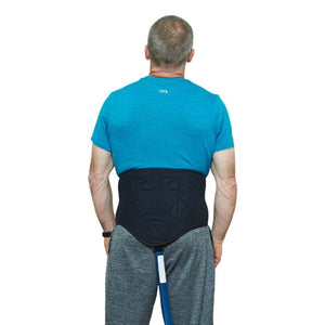Man wearing a black lumbar support belt over a blue t-shirt