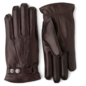 Hestra dark brown leather gloves with wrist strap and snap button closure