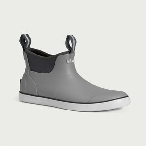 Grey Huk performance ankle boot with white sole and pull tabs