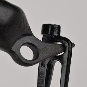 Close up of black cast iron Snow Peak cooking equipment hinge mechanism
