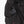 Black heated ski pants with a battery pack in the zippered pocket and a power button on the front