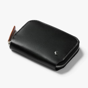 Bellroy black leather zip wallet with silver owl logo
