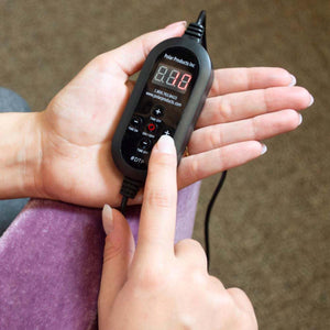 Polar Products digital controller held in hand with display and buttons