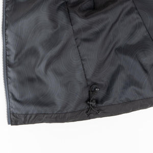 Black jacket interior lining with topographic map pattern and adjustable drawstring hem