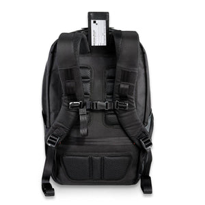 Back view of black Briggs and Riley backpack with padded straps and luggage tag