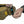 Hands attaching a black rubber ice cleat with blue studs to the sole of a tan work boot