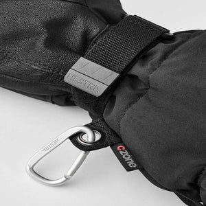 Black Hestra glove with velcro wrist strap and attached silver carabiner