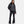 Under Armour black hooded puffer jacket worn with black flared leggings