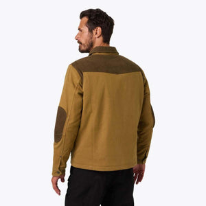 Man wearing a tan Mobile Warming jacket with brown shoulder and elbow patches viewed from the back