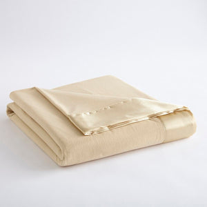 Shavel beige fleece blanket with satin trim