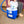 Person placing water bottle into Polar Products active cold therapy system cooler