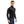 Man wearing a black long sleeve quarter zip base layer with red seam detailing