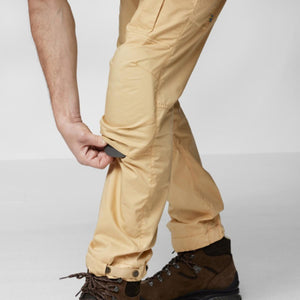 FjallRaven trousers with knee pad pocket being opened by hand