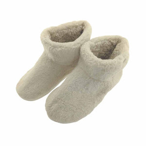 Pair of cream colored faux fur ankle slippers