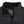 Close up of black Radians heated vest collar with care instructions label