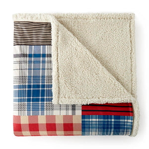 Shavel patchwork throw blanket with plaid and striped patterns and cream sherpa reverse