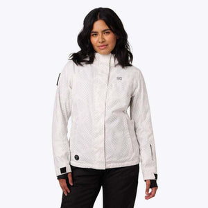 Woman wearing a white patterned ski jacket with black pants