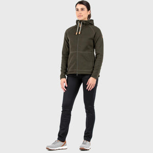 Woman wearing a dark green Fjallraven fleece hoodie and black trousers