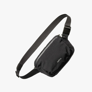 Black Bellroy sling bag with adjustable strap and zipper closure