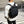 Person wearing a black Bellroy backpack with top carry handles