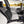 Black lumbar support cushion placed on a car seat