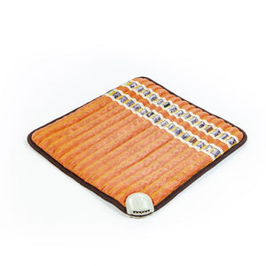 Square orange heating pad with embedded crystal stones and a power connector