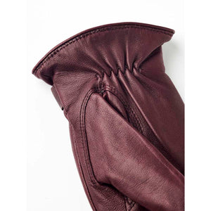 Hestra burgundy leather glove cuff detail