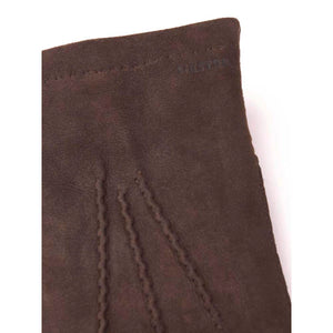 Close up of brown Hestra suede glove cuff with decorative stitching