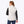 Back view of a woman wearing a white Mobile Warming fleece vest over a black and white striped long sleeve shirt