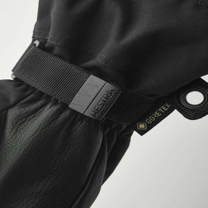 Black Hestra glove wrist strap with Gore-Tex branding