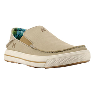 Korkers tan canvas slip on shoe with white rubber sole and blue patterned interior lining
