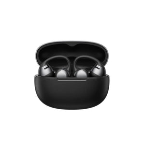 Black wireless earbuds with ear hooks inside an open charging case