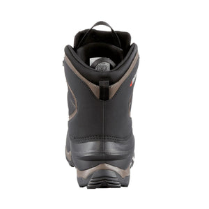 Back view of a black and brown Baffin winter boot showing the heel and size label