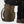 Person sitting on a dark olive FjallRaven backpack wearing black trousers and brown leather hiking boots