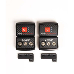 Two Lenz body heat system battery packs with snap connectors and storage covers