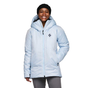Person wearing a light blue Black Diamond insulated hooded jacket with a black beanie