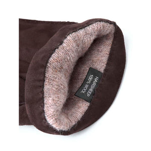 Hestra brown suede glove interior with wool lining and material label