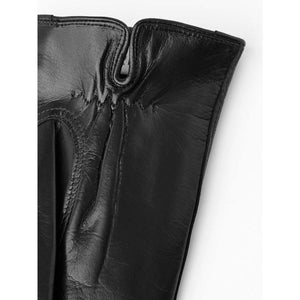 Close up of Hestra black leather glove cuff