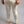 Merino Skins cream thermal leggings worn by a person