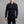 Man wearing a black Merino Skins long sleeve zip neck thermal top