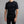 Man wearing a black Merino Skins short sleeve crew neck base layer