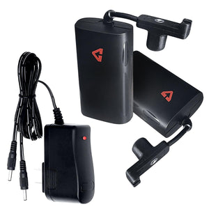 Two black battery packs with charging cables and a wall adapter
