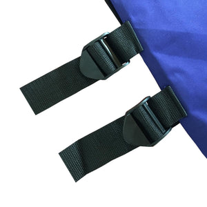 Two black nylon straps with plastic side release buckles attached to blue fabric