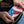 Hands stretching Chill-Its performance knit fabric with American flag pattern