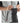Person inserting a Therm-ic heat pack into a black winter glove