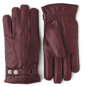 Hestra burgundy leather gloves with snap button wrist closure