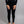 Person wearing black Merino Skins long sleeve top and leggings