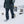 Person wearing Baffin winter boots and outdoor gear walking in deep snow