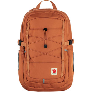 Fjallraven orange backpack with front bungee cord system and logo patch