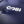 Water beading on a navy blue fabric with a white Gobi logo